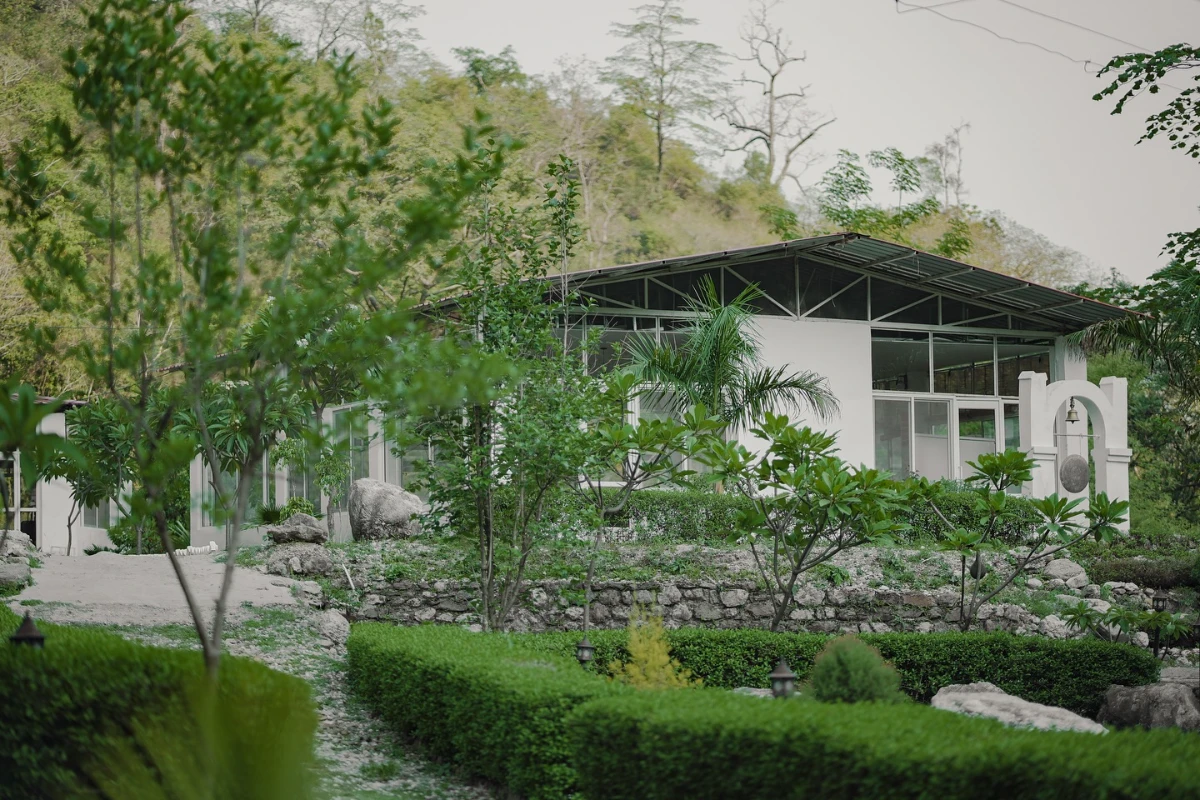 The Adhiroha ashram ashram resting among the green Himalayan foothills