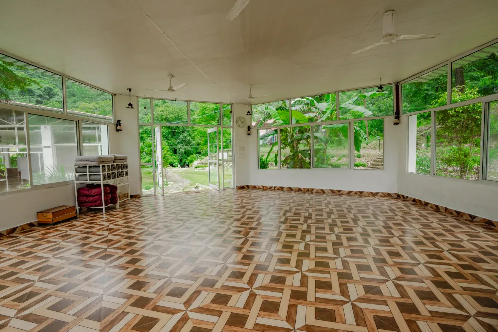 Inside the forest-view yoga shala at Adhiroha, Rishikesh — photo 84