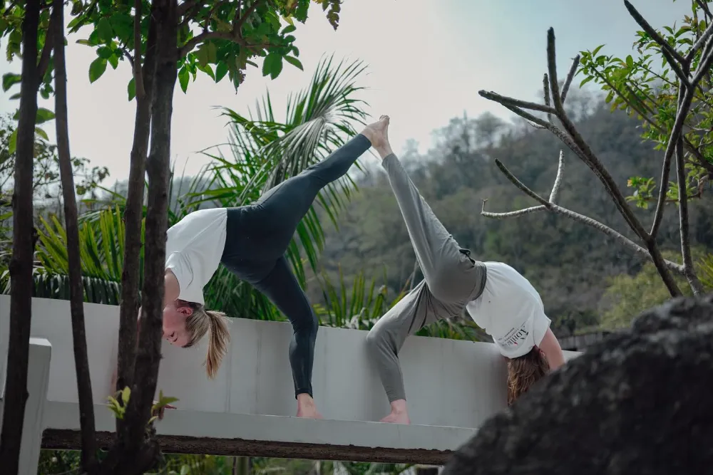 Students moving through deep, unhurried practice in the shala