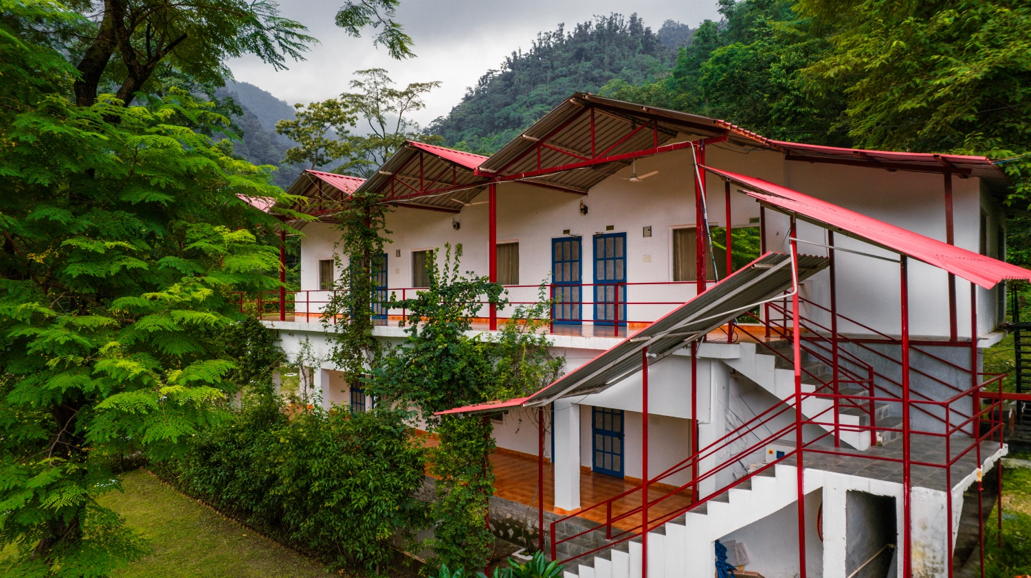The Adhiroha ashram resting in the green hills of Upper Tapovan