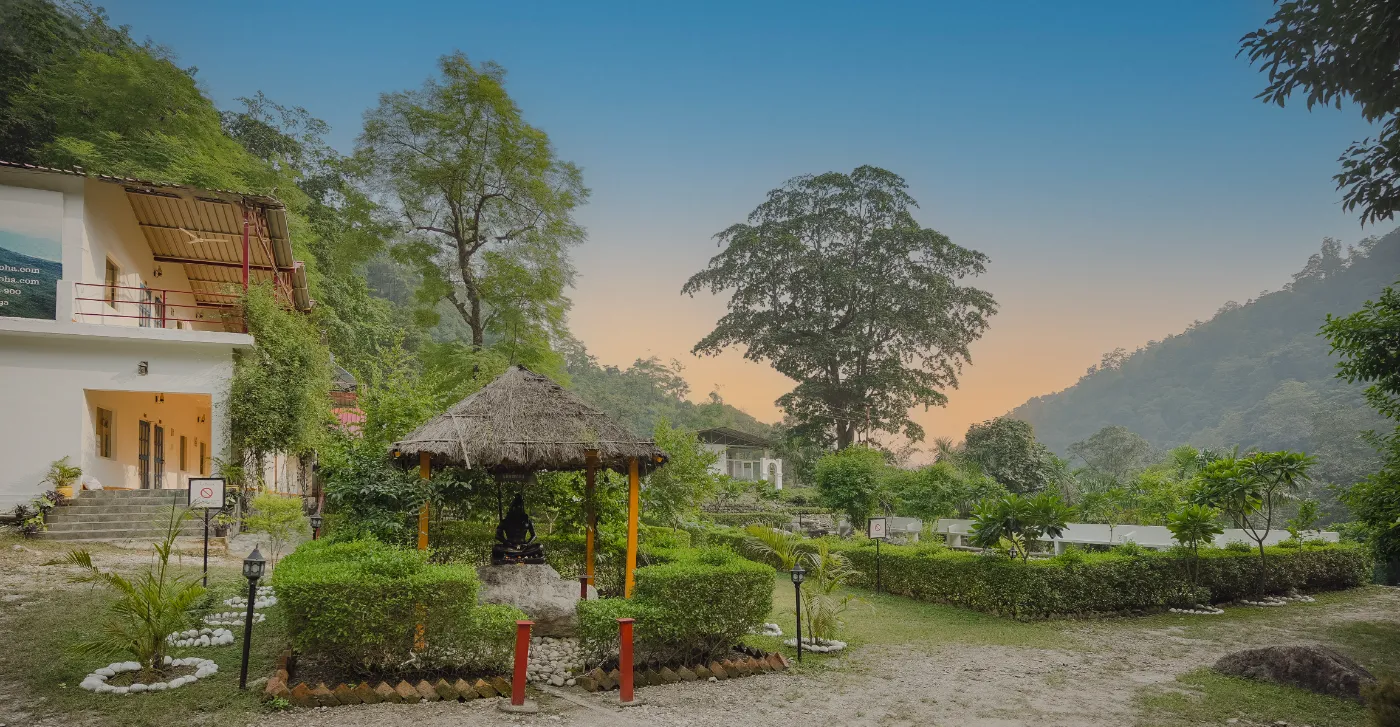 A quiet garden gazebo as evening settles over the hills