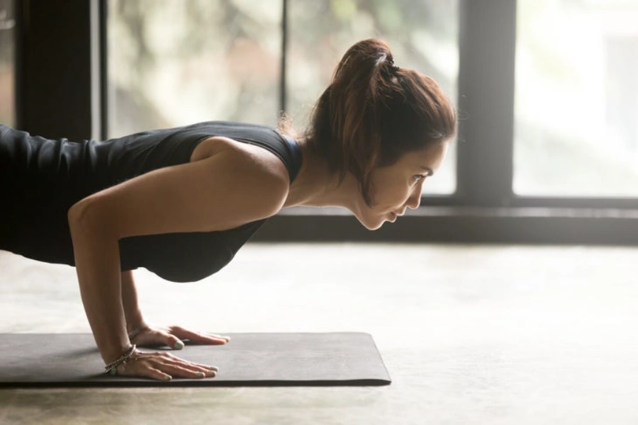 student practising sun salutation sequence